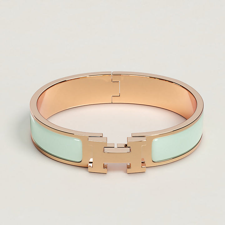 HERMES H BRACELET IN GOLD