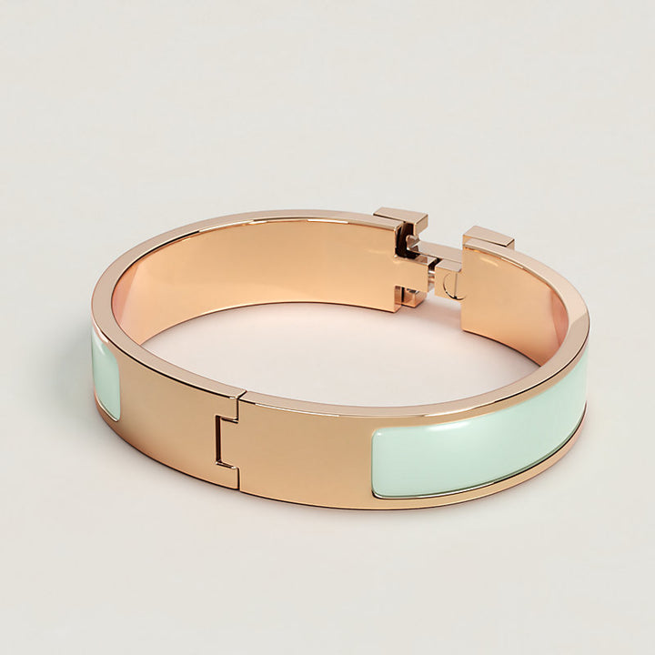 HERMES H BRACELET IN GOLD